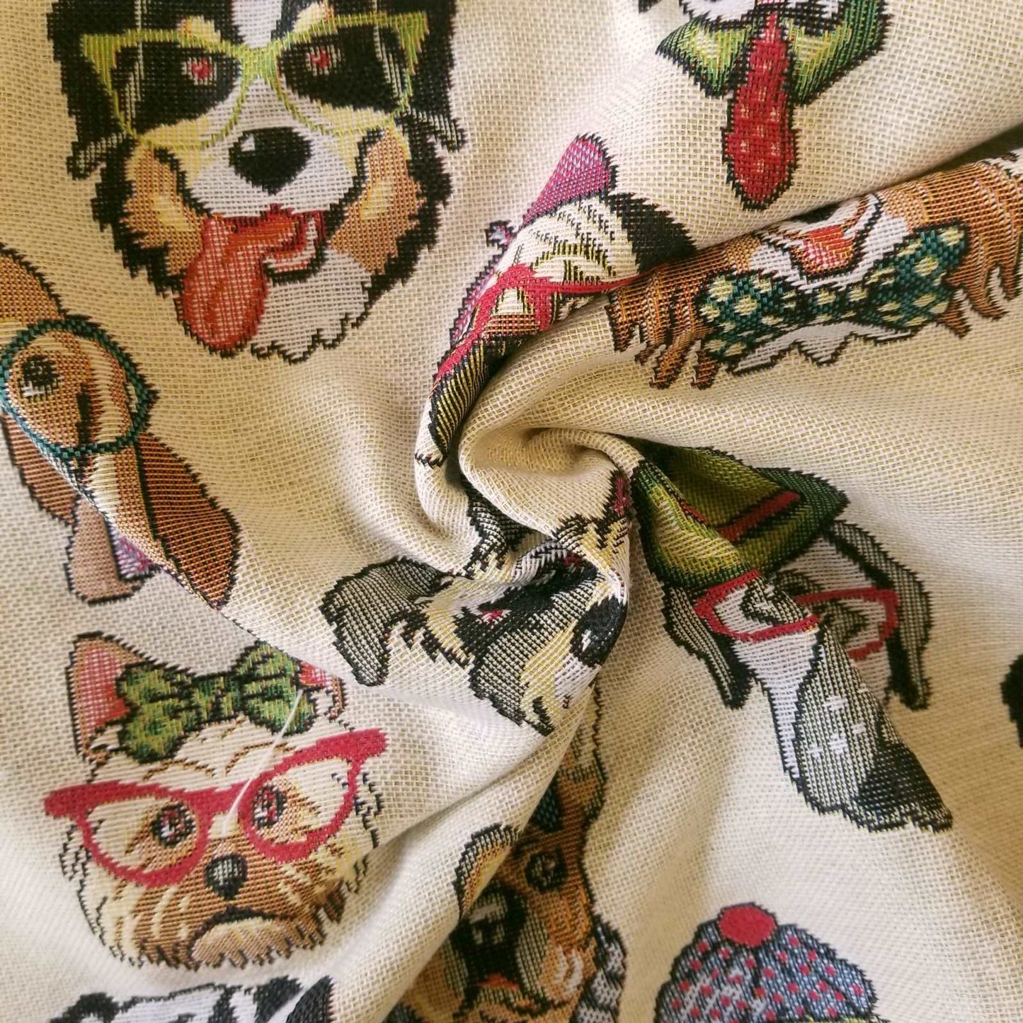 Tapestry fabric with a design of multicolour cartoon dog faces for curtains or upholstery
