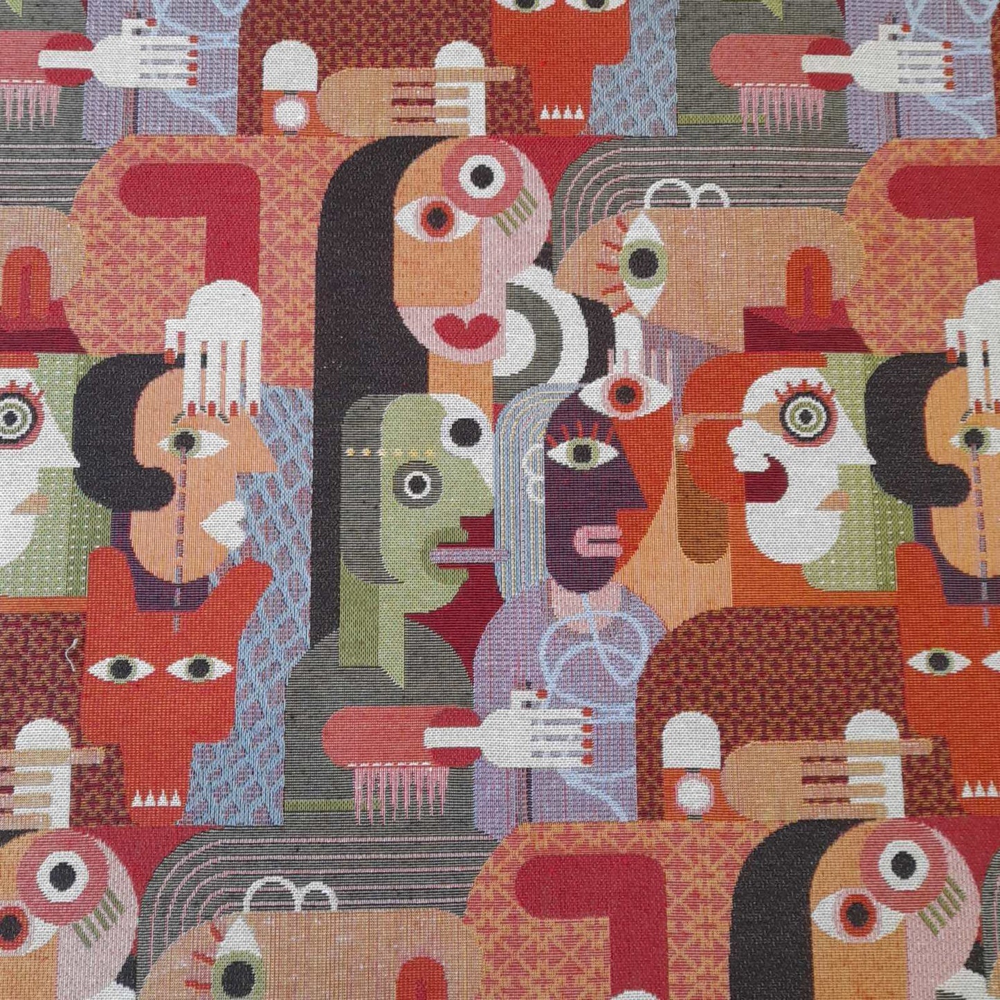 Tapestry fabric with stylised faces in a cubism type design