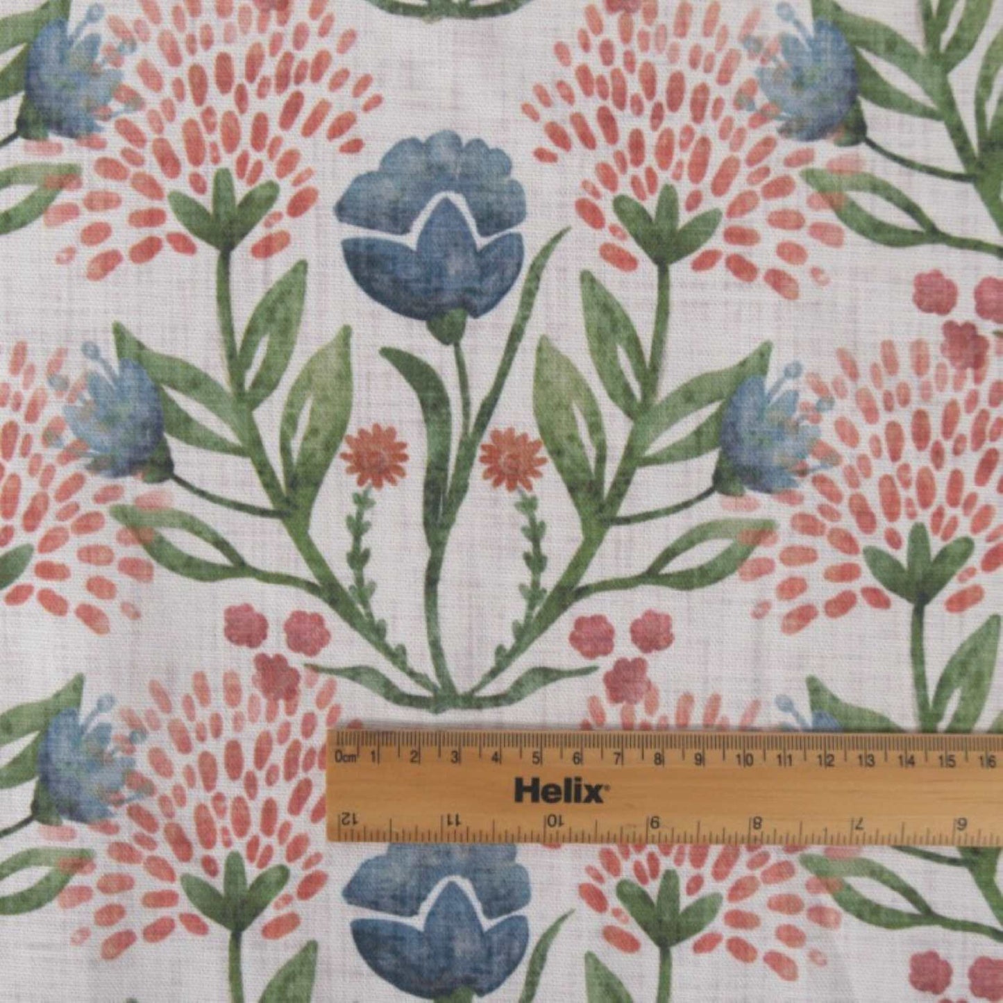 Half panama off white fabric with a rule showing the size of the floral print