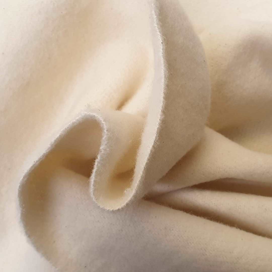 Lightweight cotton curtain interlining to add warmth cream colour