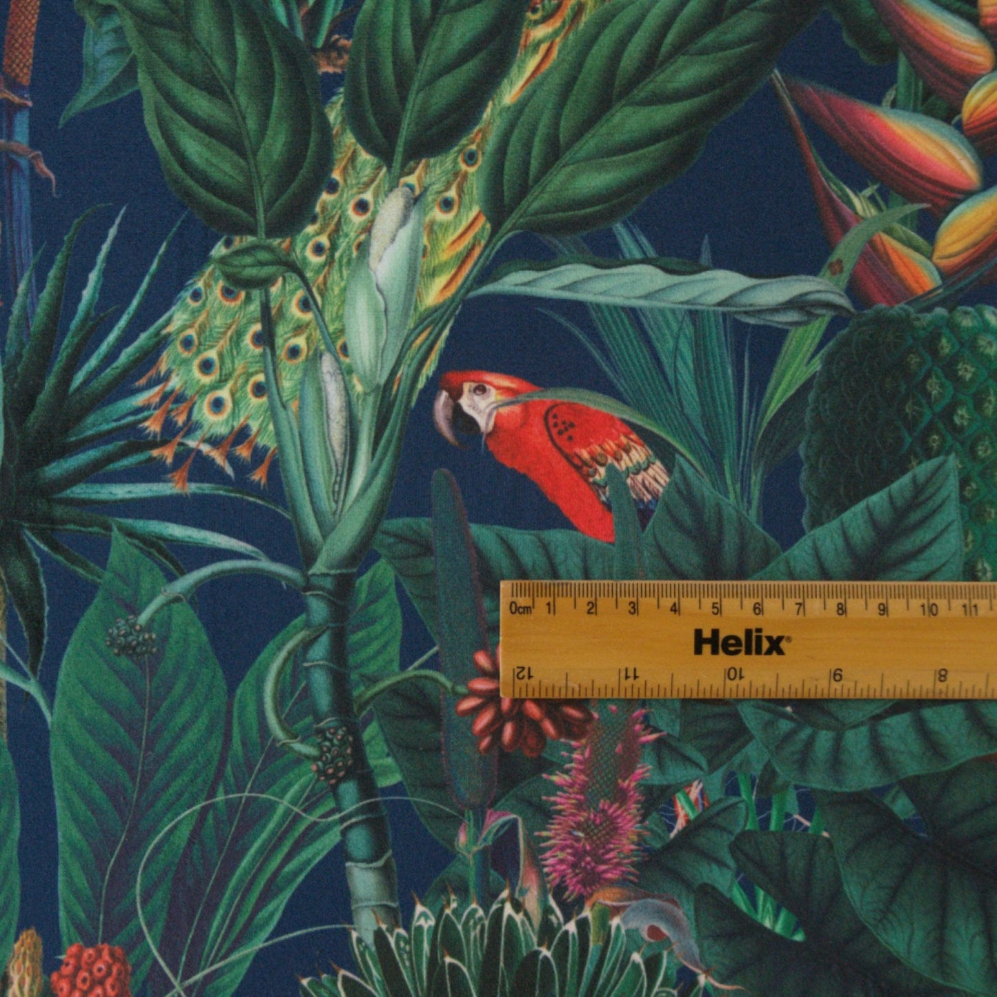 Navy Blue Velvet with a rule to show the size of the jungle flower and animal pattern