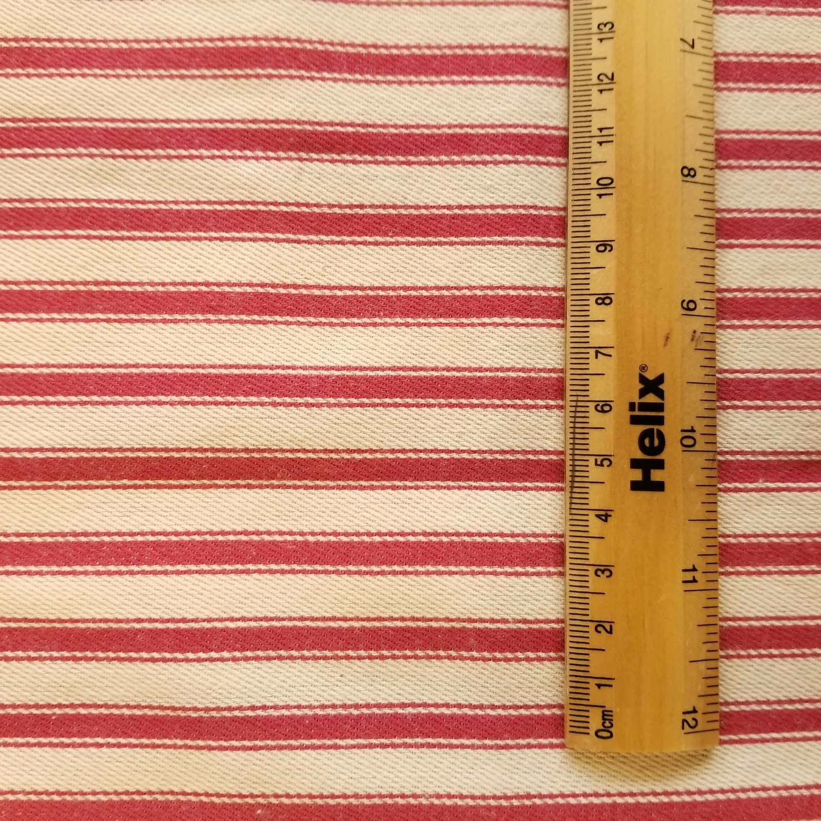 Soft Ticking Fabric with rule showing size of the red stripes
