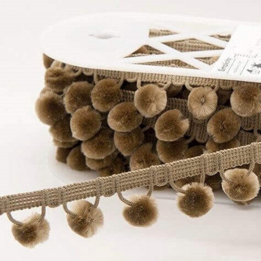 Neutral stone colour pom pom trim to buy online
