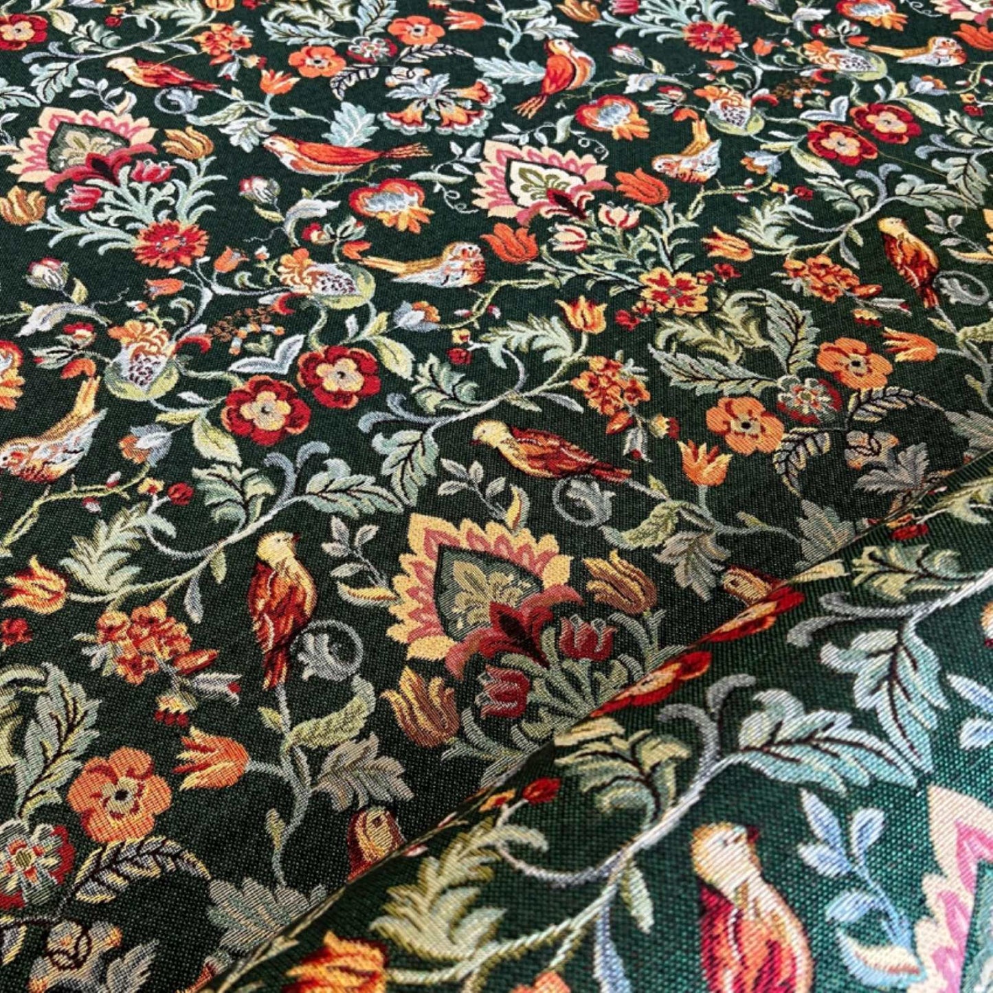 Dark green tapestry fabric with traditional William Morris design