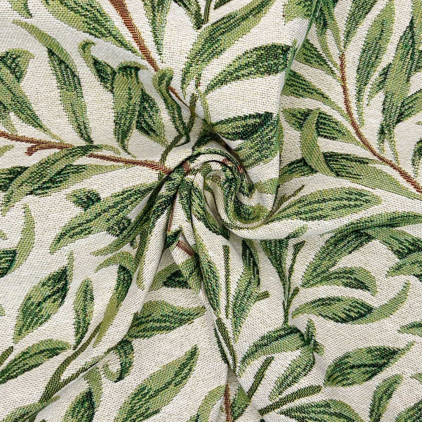 William Morris all over leaf design tapestry fabric with a cream background for curtains or upholstery