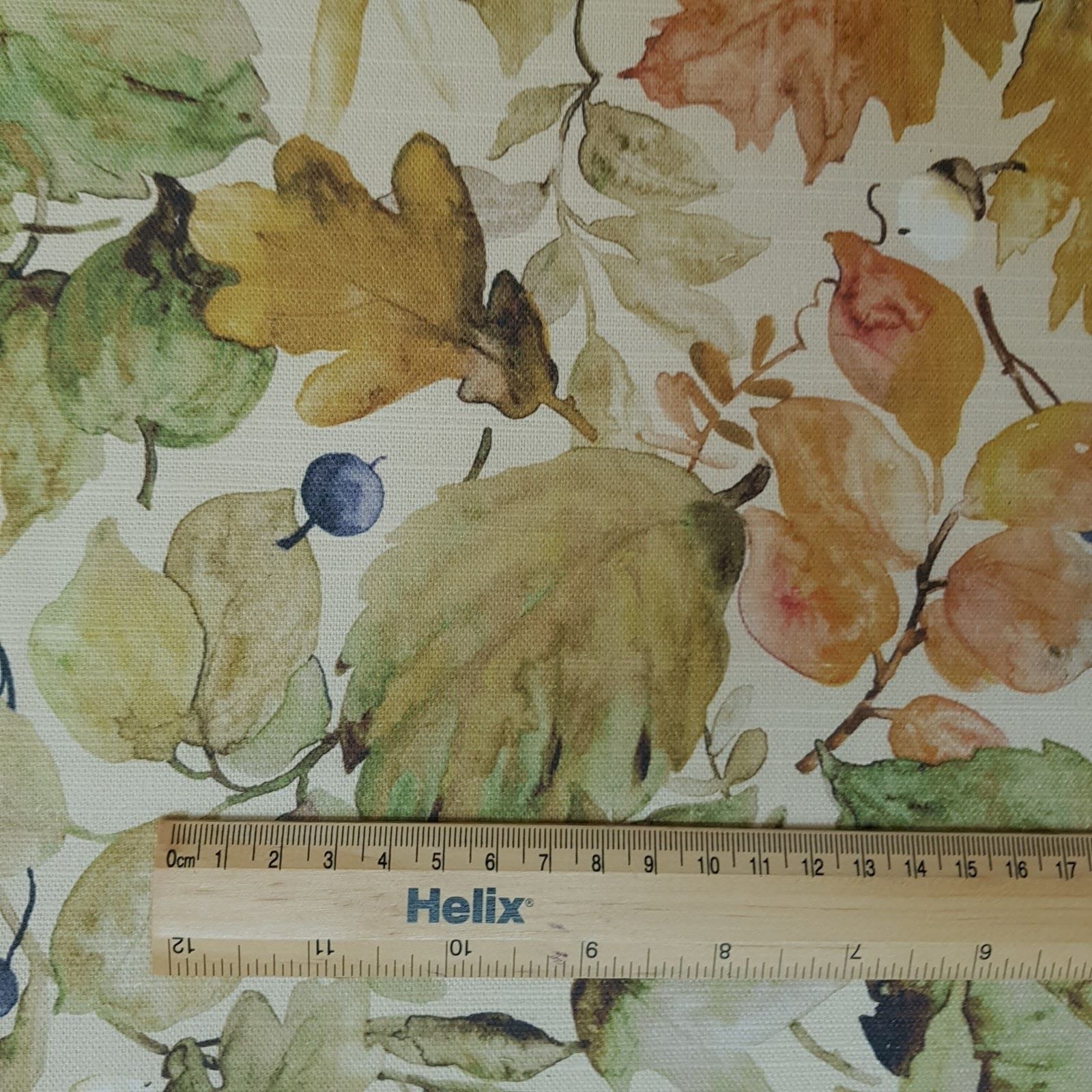 Curtain fabric with a rule showing scale of autumn leaves design