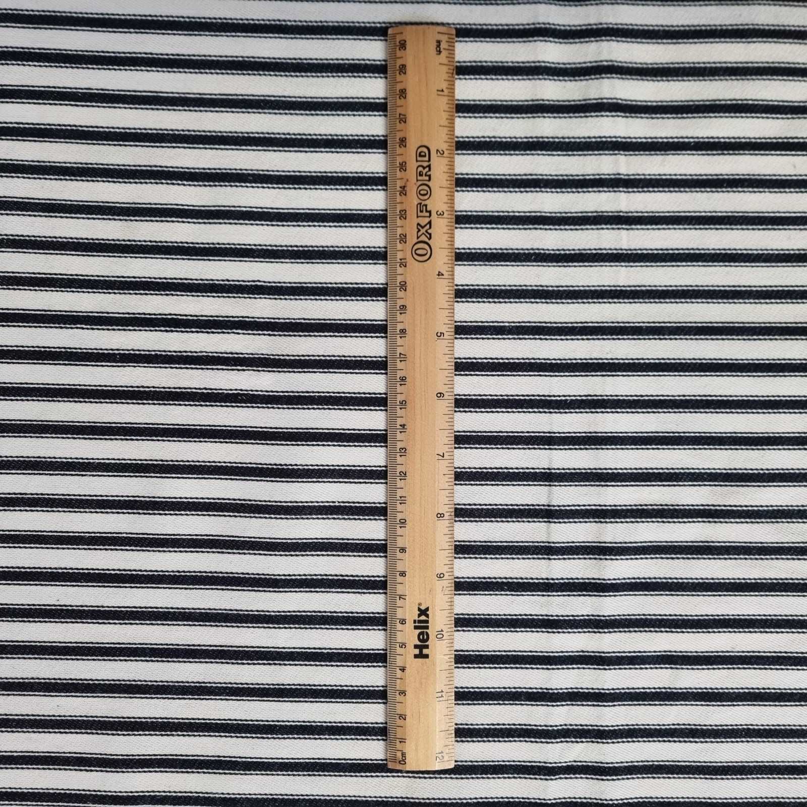 Soft Ticking Fabric with rule showing size of the black stripes