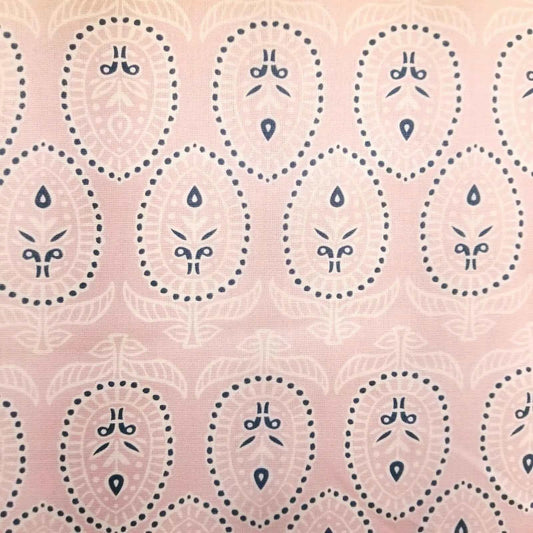 Pale pink block print fabric with floral design 