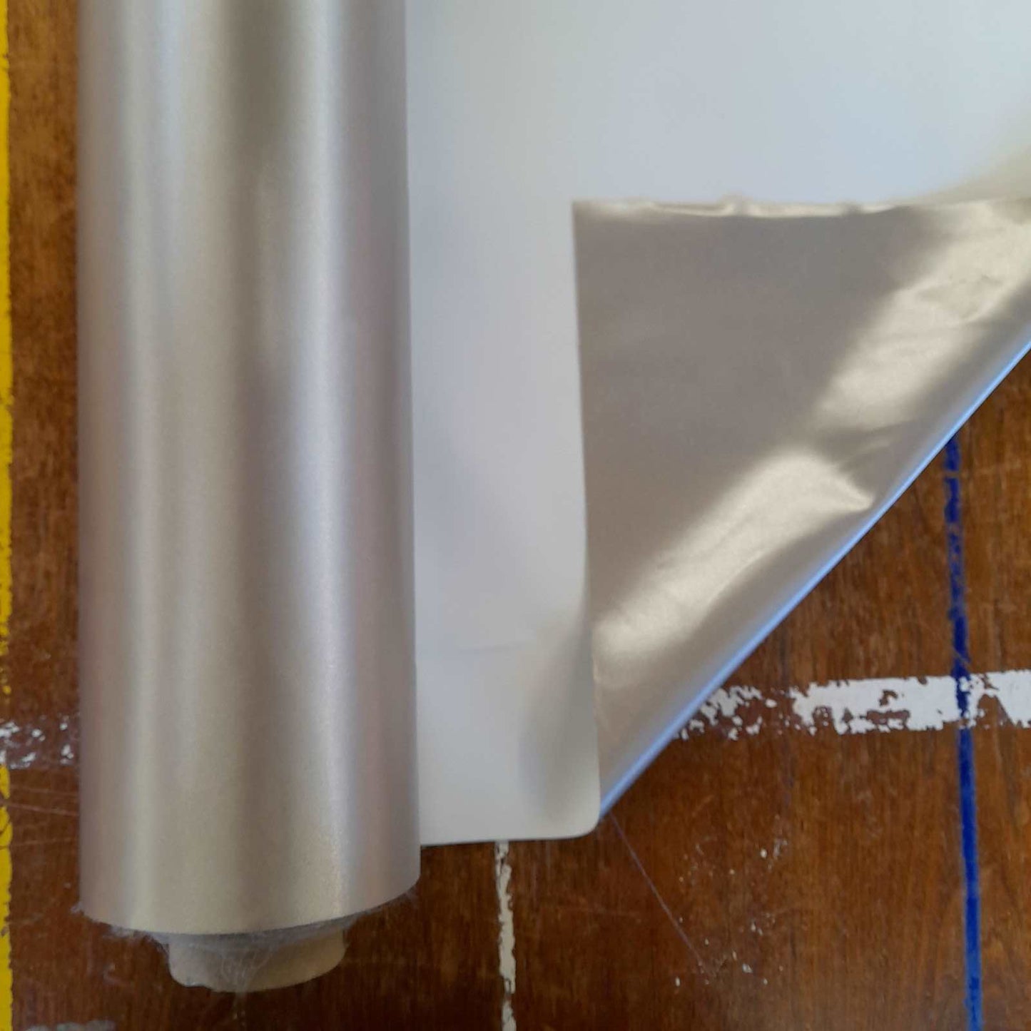 Metallic coated curtain lining reflects heat 