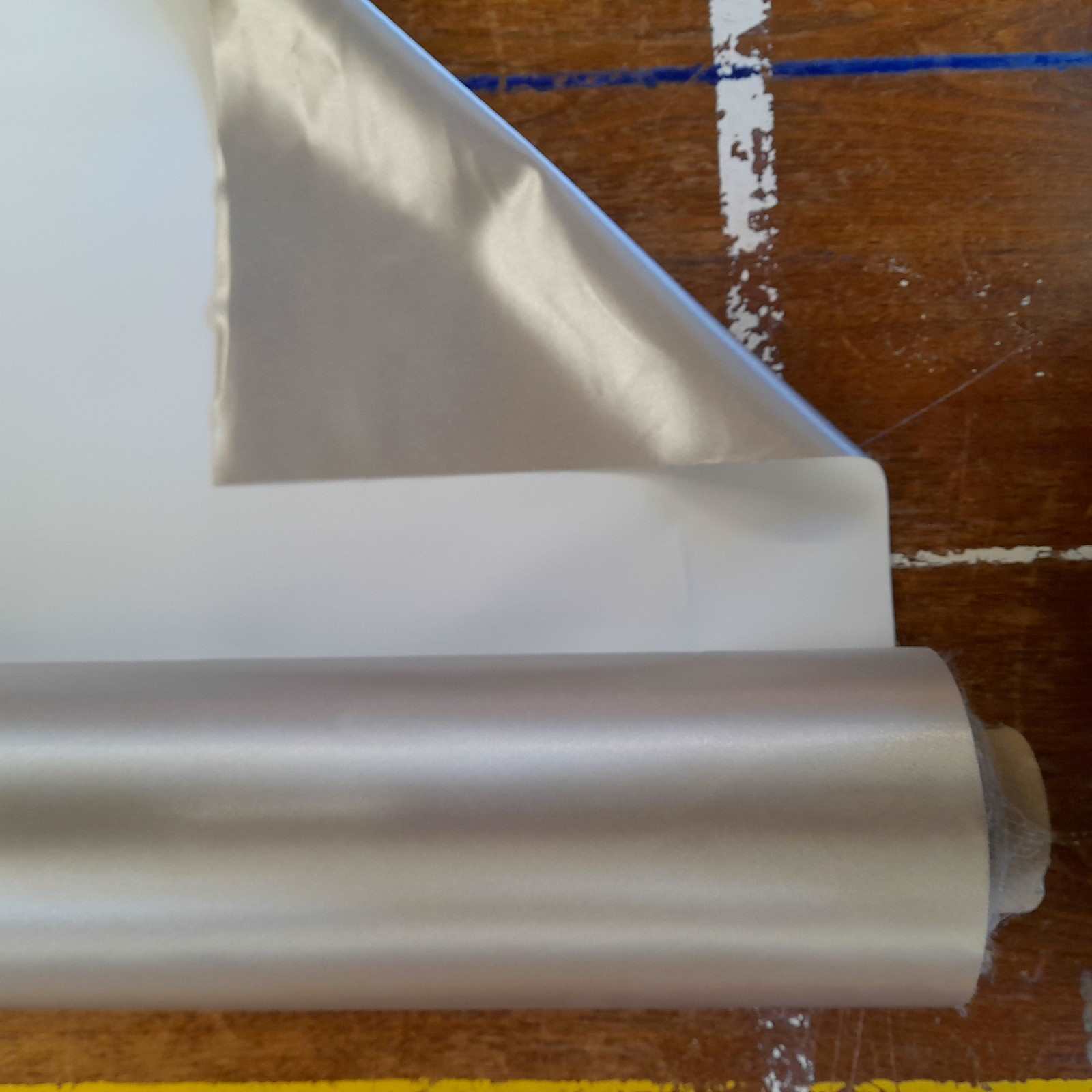 Metallic coated curtain lining reflects heat 