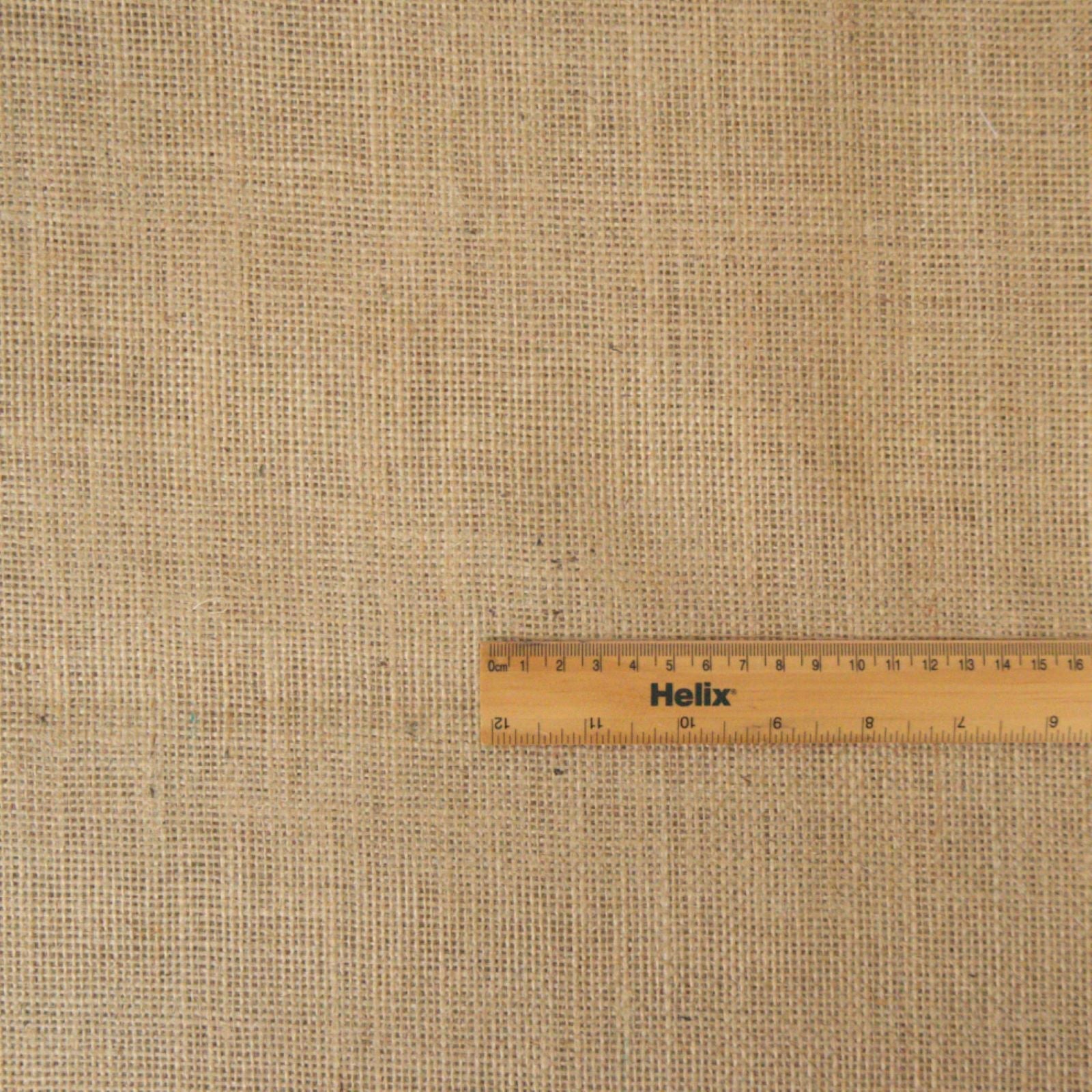 Natural jute hessian 10 ounce weight with a rule for scale