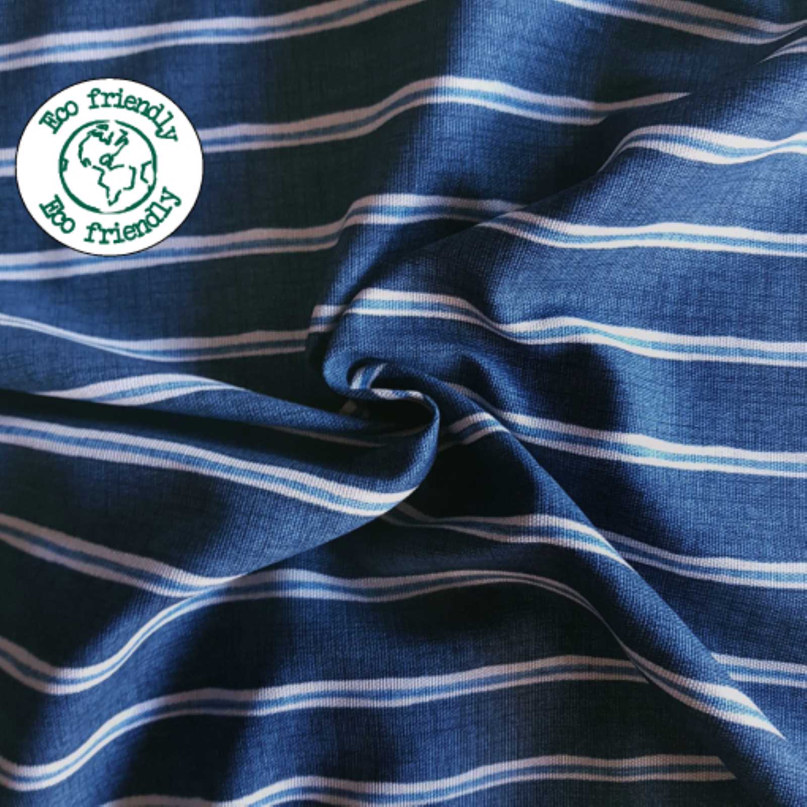Navy Blue striped fabric with narrow off white and mid blue stripes