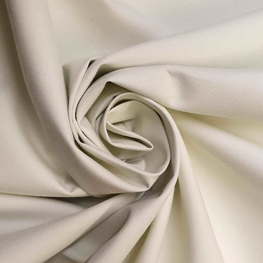 Soft drape blackout curtain lining. Cream coloured lining with a coating preventing light penetrating the fabric