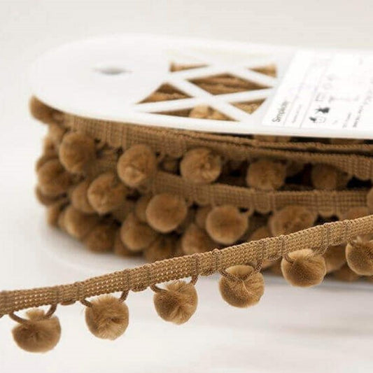 Straw colour pom pom trim to buy online