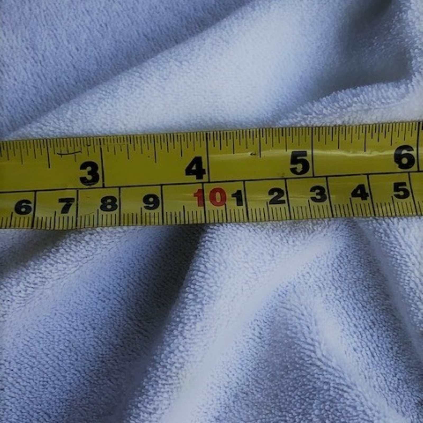 Cotton towelling fabric with rule for scale