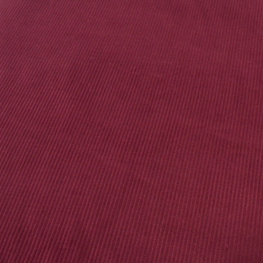 Wine Red Cotton 8 wale corduroy fabric photographed at an angle